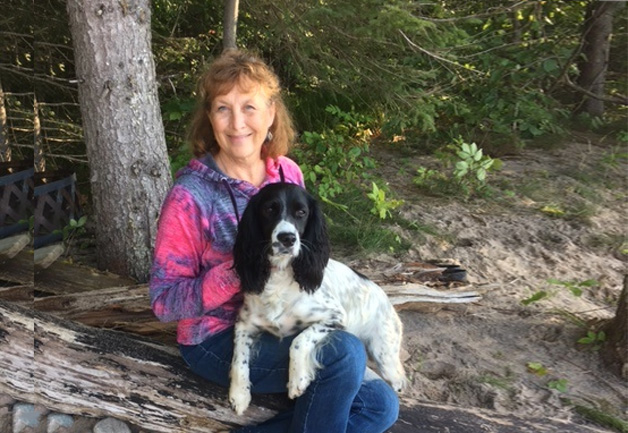 Sandy with her dog Molly, a Springer Spaniel