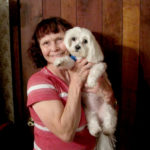 Kay with Pet Partner Jesse, a Maltese mix