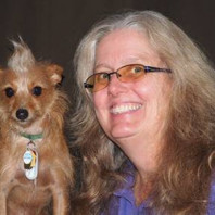 Janet with Chewie, a Chihuahua Yorkie mix