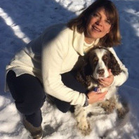 Portrait in the snow - Sue with dog Molly-Springer Spaniel