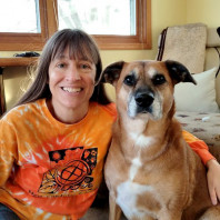 Members Beth and dog Maggie, a Boxer-mix