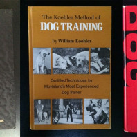 Covers of dog training books from the old days